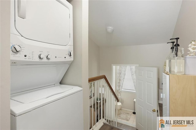516 Great Beds Ct, Perth Amboy, NJ 08861 - laundry room featuring stacked washer / drying machine