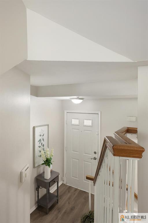 516 Great Beds Ct, Perth Amboy, NJ 08861 - entryway featuring dark wood-type flooring and baseboards