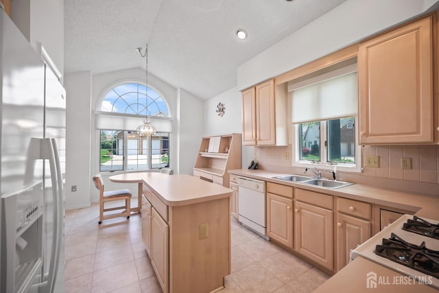 11 Wintons Way, Monroe, NJ 08831 - kitchen with refrigerator with ice dispenser, a sink, dishwasher, light brown cabinets, and vaulted ceiling