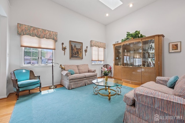 11 Wintons Way, Monroe, NJ 08831 - living room with a skylight, wood finished floors, baseboards, recessed lighting, and vaulted ceiling