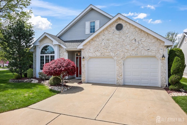 11 Wintons Way, Monroe, NJ 08831 - traditional-style home featuring stone siding, an attached garage, concrete driveway, a front lawn, and a shingled roof