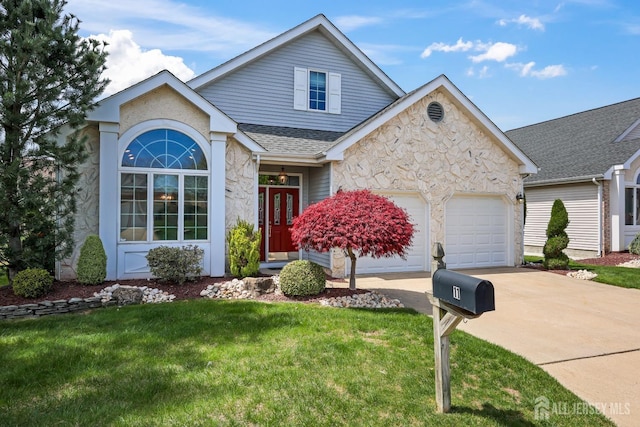 11 Wintons Way, Monroe, NJ 08831 - traditional home featuring stone siding, concrete driveway, an attached garage, a front lawn, and roof with shingles
