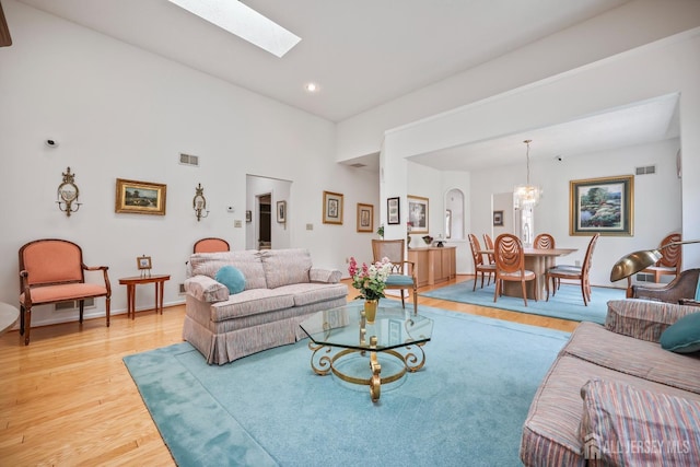 11 Wintons Way, Monroe, NJ 08831 - living room with light wood-style floors, a skylight, recessed lighting, and a high ceiling