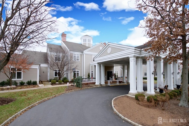 11 Wintons Way, Monroe, NJ 08831 - view of front of property with driveway, a carport, a chimney, and a shingled roof