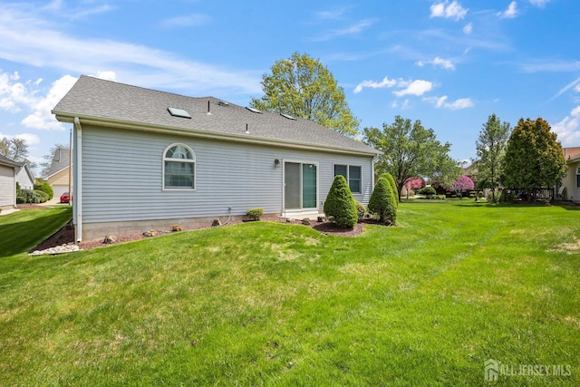 11 Wintons Way, Monroe, NJ 08831 - rear view of house featuring a lawn