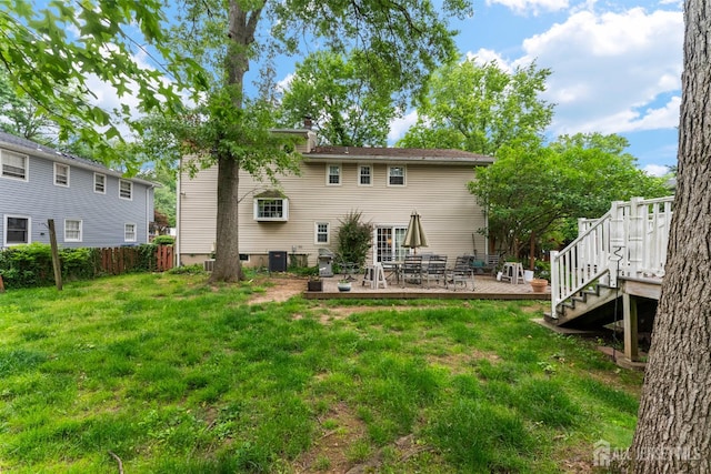25 Turner Ave, Edison, NJ 08820 - back of house with a wooden deck, stairway, and a chimney