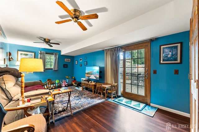 25 Turner Ave, Edison, NJ 08820 - living area with healthy amount of natural light, wood finished floors, ceiling fan, and baseboards