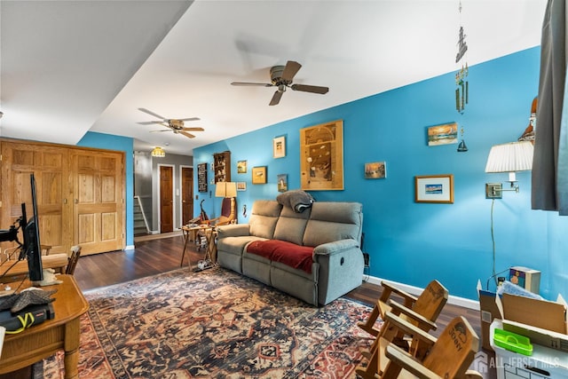25 Turner Ave, Edison, NJ 08820 - living area with wood finished floors, baseboards, ceiling fan, and stairway