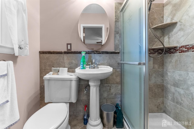 25 Turner Ave, Edison, NJ 08820 - full bath with toilet, a stall shower, tile walls, and a wainscoted wall