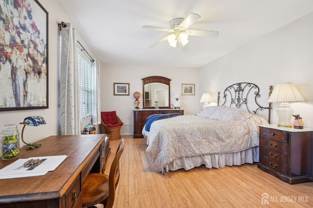 bedroom featuring ceiling fan and light hardwood / wood-style flooring