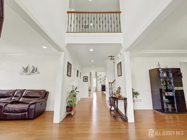 6 Condor Ct, South Brunswick, NJ 08852 - entrance foyer featuring wood finished floors, crown molding, recessed lighting, and baseboards