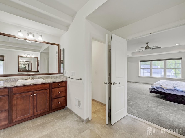 6 Condor Ct, South Brunswick, NJ 08852 - ensuite bathroom with baseboards, vanity, ceiling fan, and tile patterned flooring