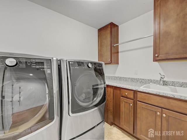6 Condor Ct, South Brunswick, NJ 08852 - laundry area with washer and dryer, cabinet space, and light tile patterned floors