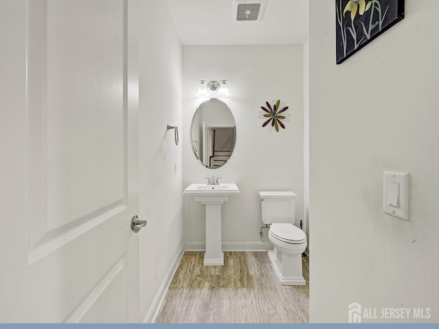 6 Condor Ct, South Brunswick, NJ 08852 - bathroom featuring toilet, baseboards, and a sink