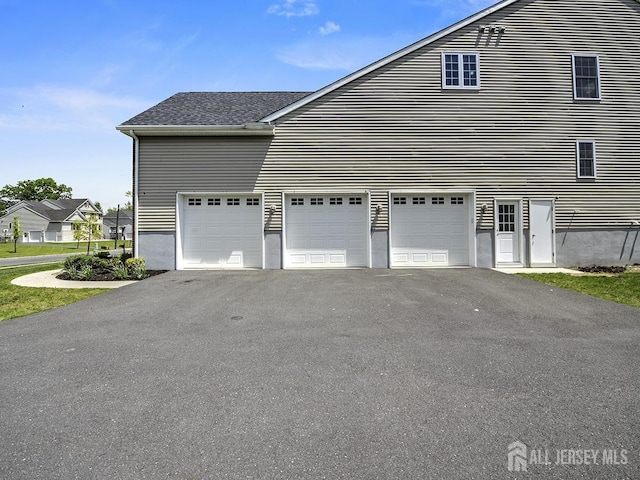 6 Condor Ct, South Brunswick, NJ 08852 - view of home's exterior featuring asphalt driveway