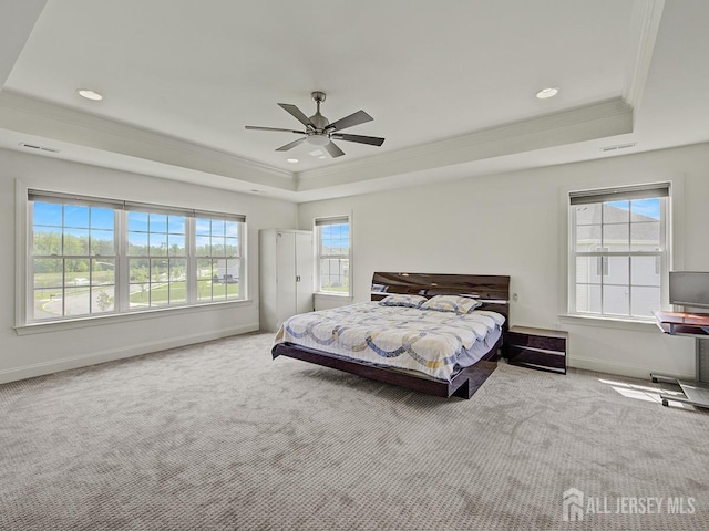 6 Condor Ct, South Brunswick, NJ 08852 - carpeted bedroom featuring a raised ceiling, crown molding, multiple windows, baseboards, and ceiling fan