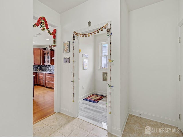 6 Condor Ct, South Brunswick, NJ 08852 - entrance foyer featuring light tile patterned floors and baseboards