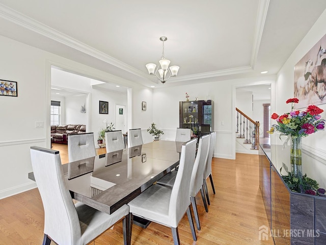 6 Condor Ct, South Brunswick, NJ 08852 - dining area featuring a chandelier, stairway, crown molding, light wood-style flooring, and recessed lighting