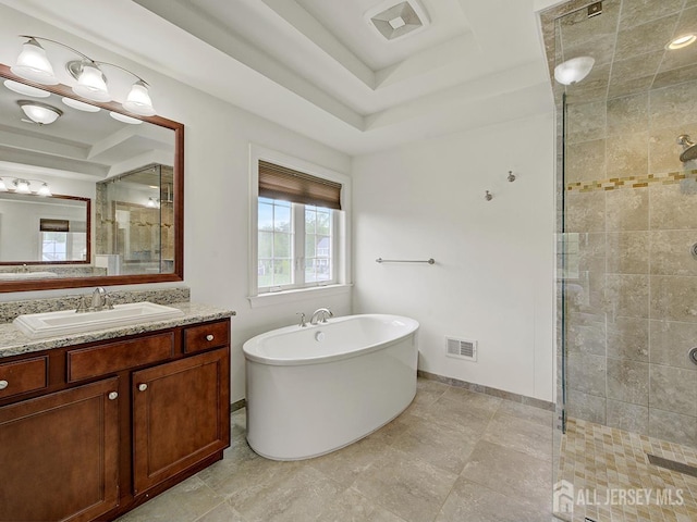 6 Condor Ct, South Brunswick, NJ 08852 - full bathroom featuring a shower stall, a freestanding tub, vanity, baseboards, and a raised ceiling