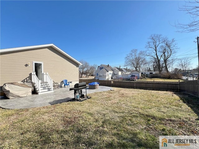 view of yard featuring a fenced backyard and a patio area