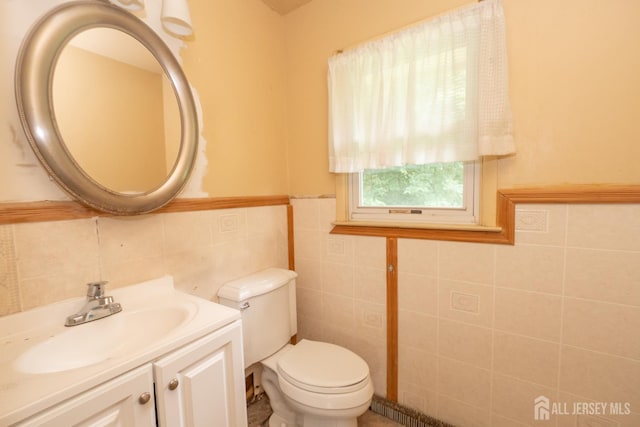 140 Prospect Plains Rd, Monroe, NJ 08831 - bathroom with tile walls, vanity, and wainscoting