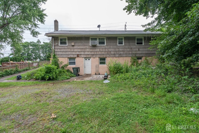 140 Prospect Plains Rd, Monroe, NJ 08831 - rear view of property with a chimney