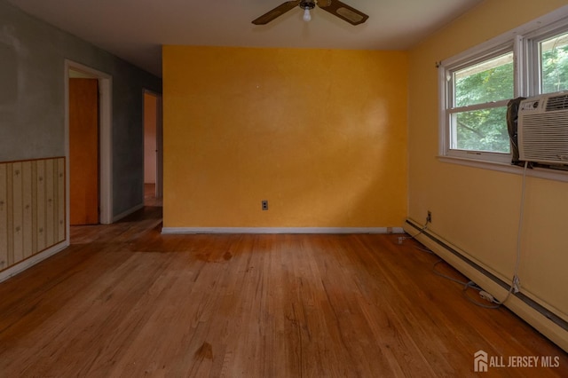 140 Prospect Plains Rd, Monroe, NJ 08831 - unfurnished room featuring a baseboard radiator, light wood-style floors, and ceiling fan