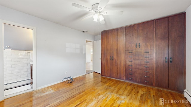 131 Hazelwood Ave, Metuchen, NJ 08840 - unfurnished bedroom featuring a baseboard heating unit, light wood-style floors, and ensuite bath