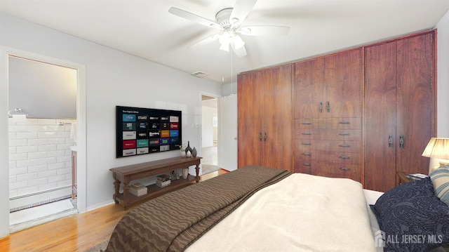 131 Hazelwood Ave, Metuchen, NJ 08840 - bedroom with wood finished floors, ceiling fan, and connected bathroom