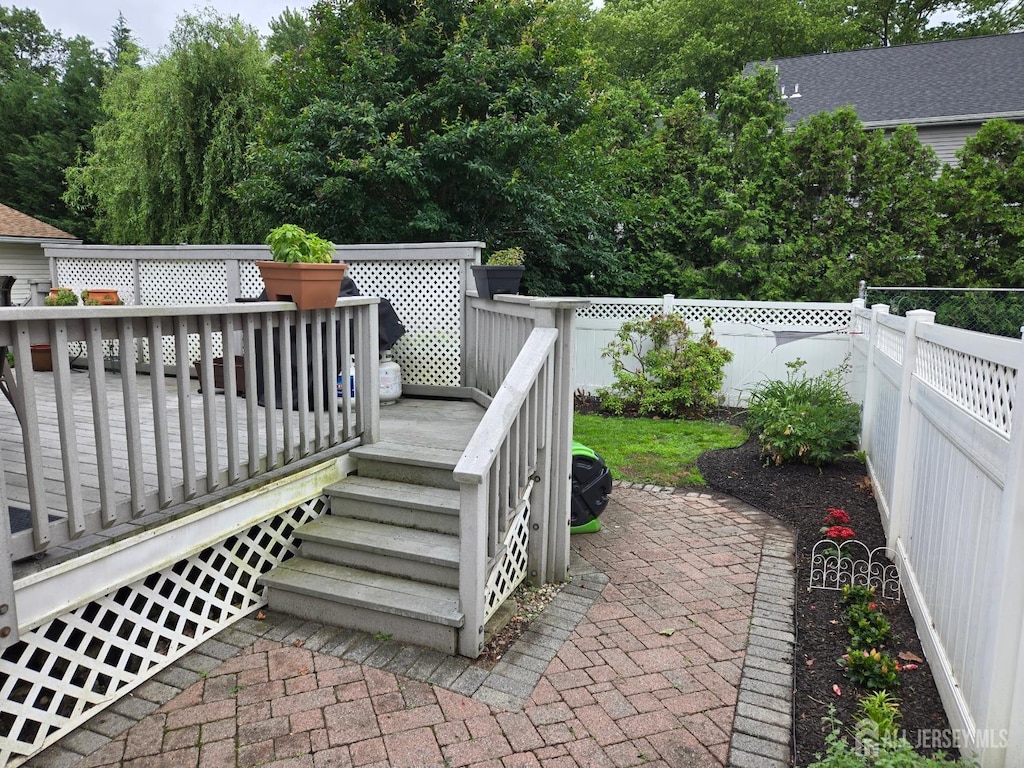 131 Hazelwood Ave, Metuchen, NJ 08840 - fenced backyard featuring a deck