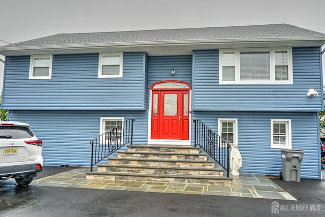 raised ranch featuring entry steps