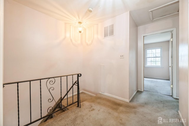 44 Townsend Dr, Old Bridge, NJ 07747 - hall with an upstairs landing, carpet floors, and baseboards