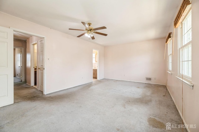 44 Townsend Dr, Old Bridge, NJ 07747 - spare room with light colored carpet, ceiling fan, and baseboards