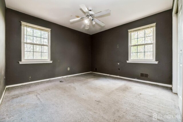44 Townsend Dr, Old Bridge, NJ 07747 - carpeted spare room featuring healthy amount of natural light, baseboards, and ceiling fan