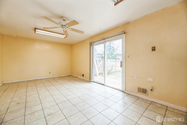 44 Townsend Dr, Old Bridge, NJ 07747 - spare room featuring a ceiling fan, light tile patterned floors, and baseboards