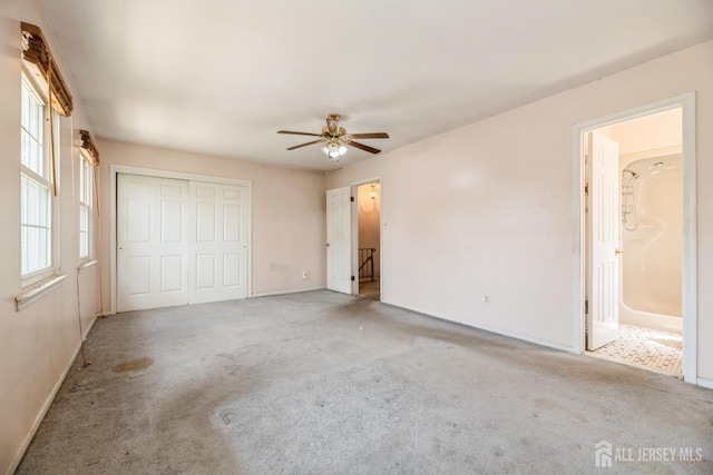 44 Townsend Dr, Old Bridge, NJ 07747 - unfurnished bedroom featuring carpet floors, baseboards, a closet, and a ceiling fan