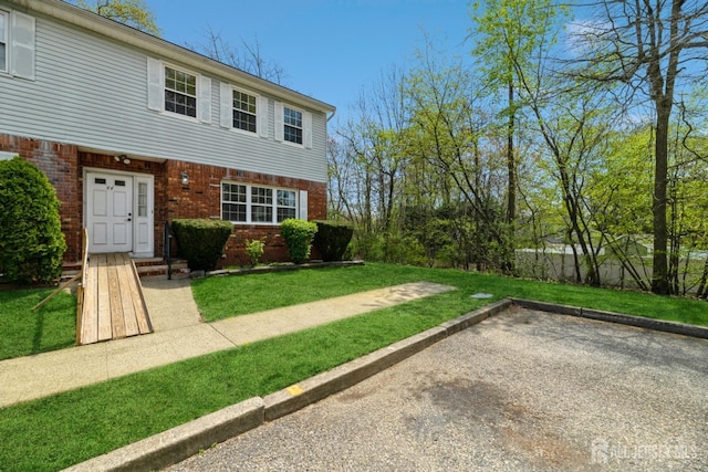 44 Townsend Dr, Old Bridge, NJ 07747 - view of front of property with brick siding and a front yard