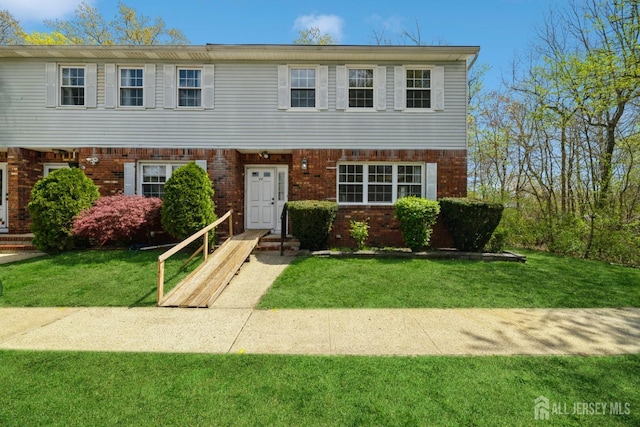 44 Townsend Dr, Old Bridge, NJ 07747 - view of property with brick siding and a front yard