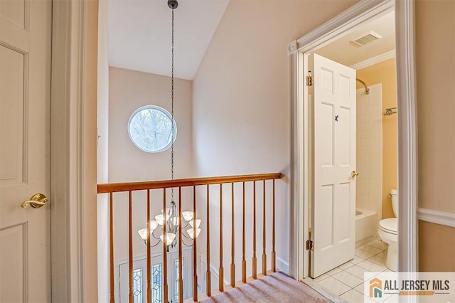 144 Coppertree Ct Unit 144, Edison, NJ 08820 - hallway with a chandelier and tile patterned floors