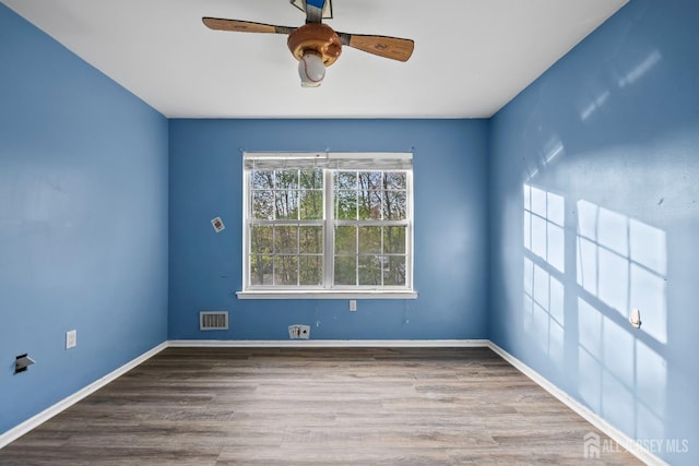 26 Jaime Ct, Old Bridge, NJ 08857 - empty room featuring ceiling fan and wood finished floors