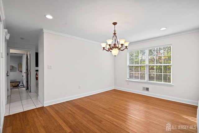 26 Jaime Ct, Old Bridge, NJ 08857 - unfurnished room featuring a chandelier, light wood-style flooring, crown molding, and recessed lighting