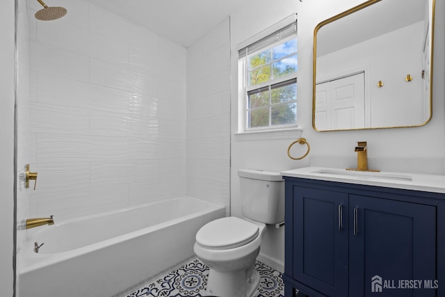 full bath featuring bathtub / shower combination, vanity, toilet, tile patterned floors, and baseboards