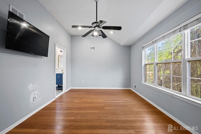 26 Jaime Ct, Old Bridge, NJ 08857 - empty room with a ceiling fan, lofted ceiling, and wood finished floors