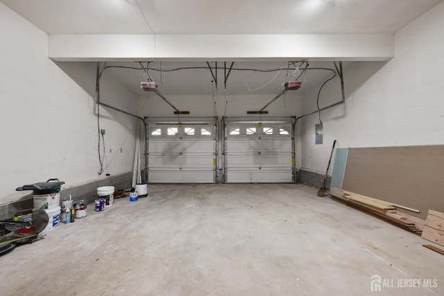 26 Jaime Ct, Old Bridge, NJ 08857 - garage featuring electric panel and a garage door opener
