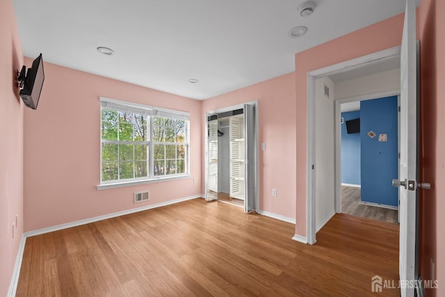 26 Jaime Ct, Old Bridge, NJ 08857 - unfurnished bedroom with wood finished floors and baseboards