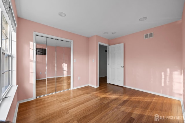 26 Jaime Ct, Old Bridge, NJ 08857 - unfurnished bedroom featuring wood finished floors and a closet