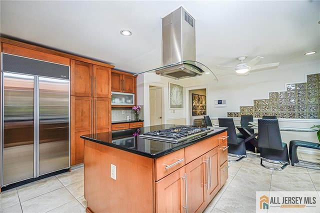 5 Leighton Dr, East Brunswick, NJ 08816 - kitchen with stainless steel appliances, island range hood, a ceiling fan, light tile patterned flooring, and recessed lighting