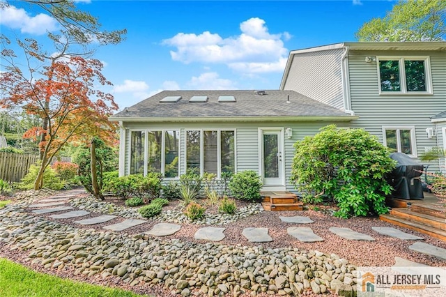 5 Leighton Dr, East Brunswick, NJ 08816 - back of house featuring a shingled roof