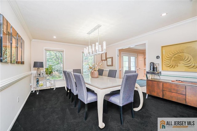 5 Leighton Dr, East Brunswick, NJ 08816 - dining area with dark colored carpet, french doors, ornamental molding, recessed lighting, and a chandelier