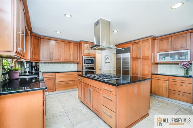 5 Leighton Dr, East Brunswick, NJ 08816 - kitchen with island range hood, built in appliances, tasteful backsplash, light tile patterned flooring, and recessed lighting